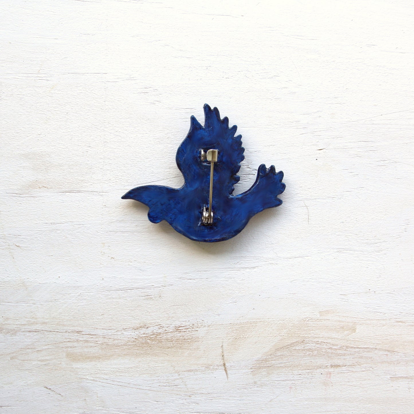 Tui Brooch